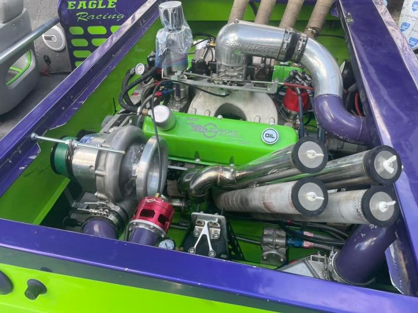 High-performance car engine with turbocharger and colorful custom components. Eagle Racing.